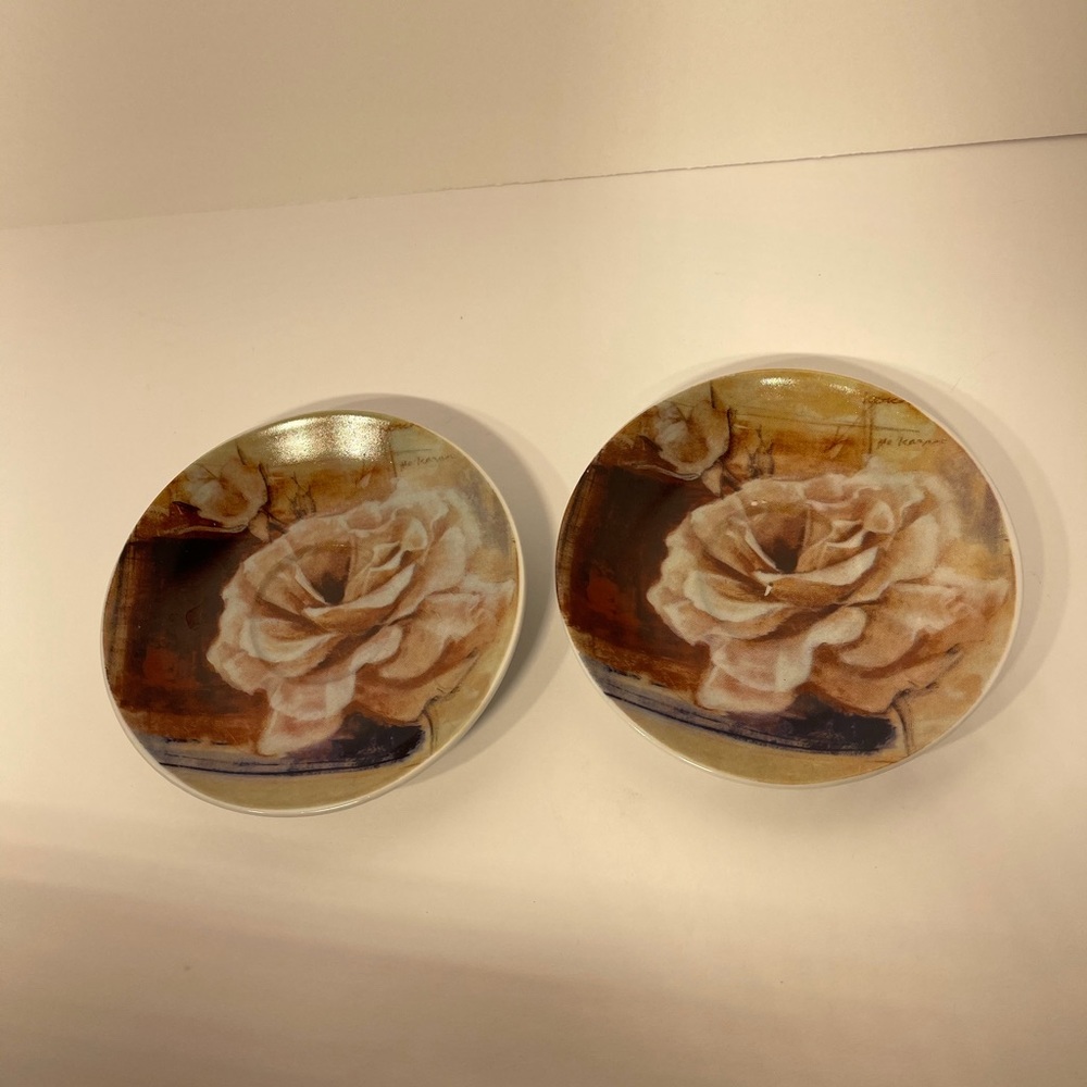 T. Bavaria butter saucers.